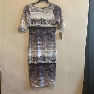 Cool printed dress. Past knee